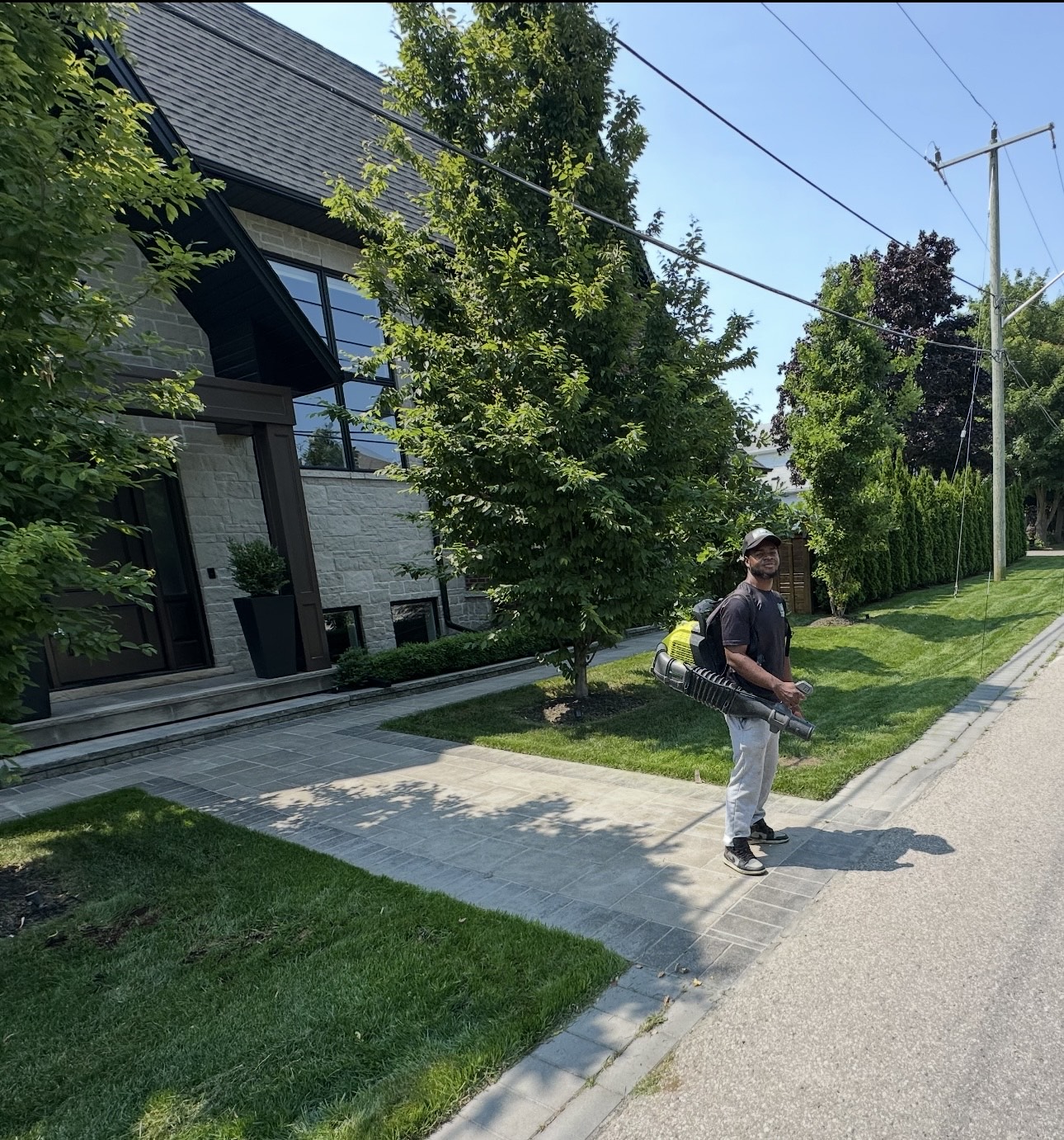 Pickering Boys Landscaping team member caring for a property in Pickering